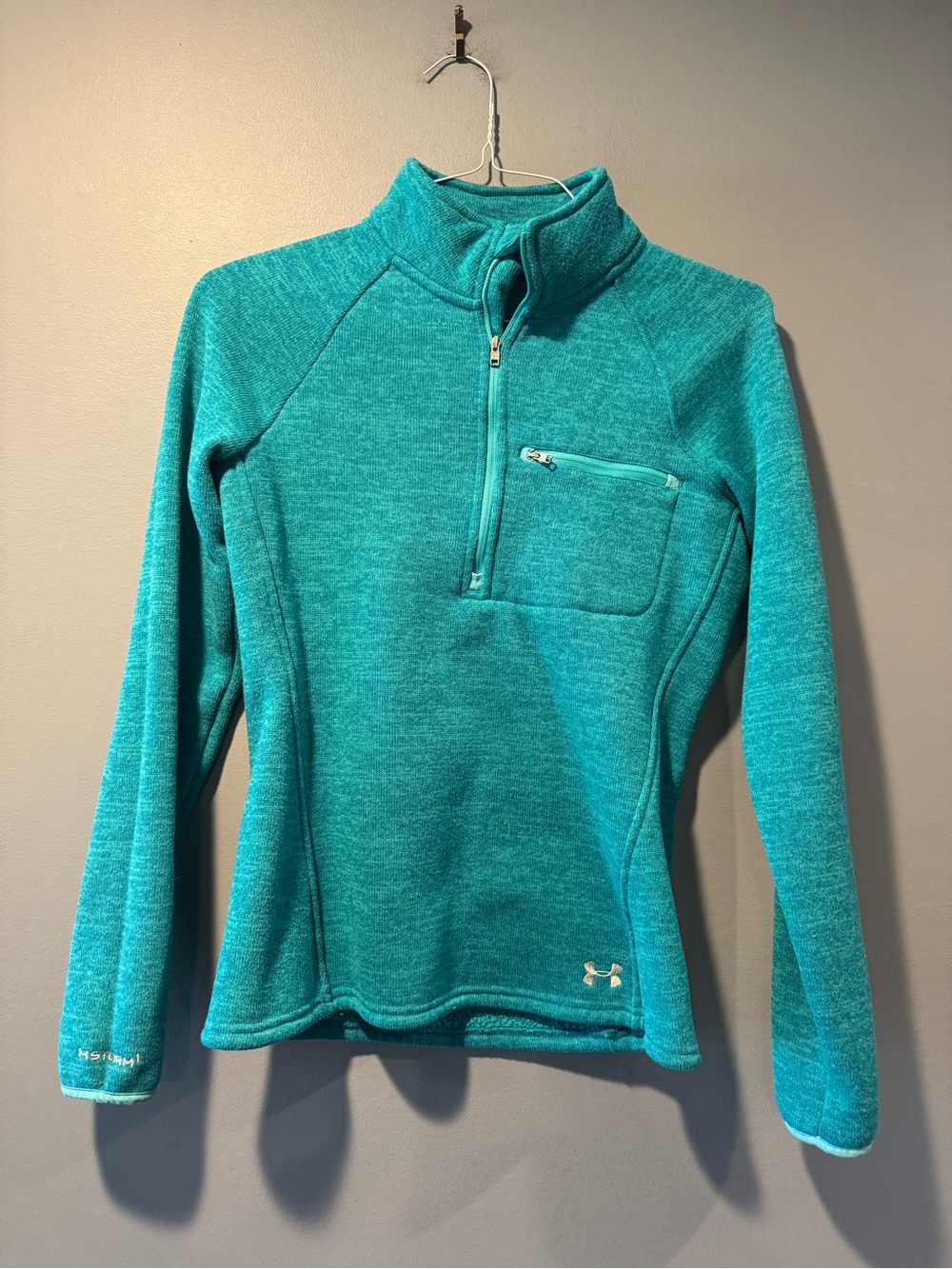 * Woman’s Green Under Armour Storm
Sweater/Pullover